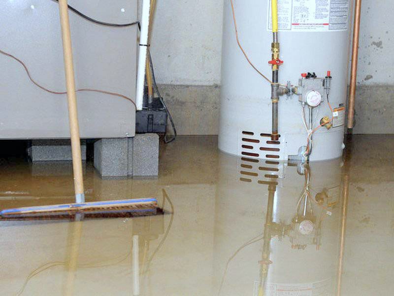 Flooded basement from clogged sewer main line needing sewer cleaning. Possible clogged drains needing drain cleaning